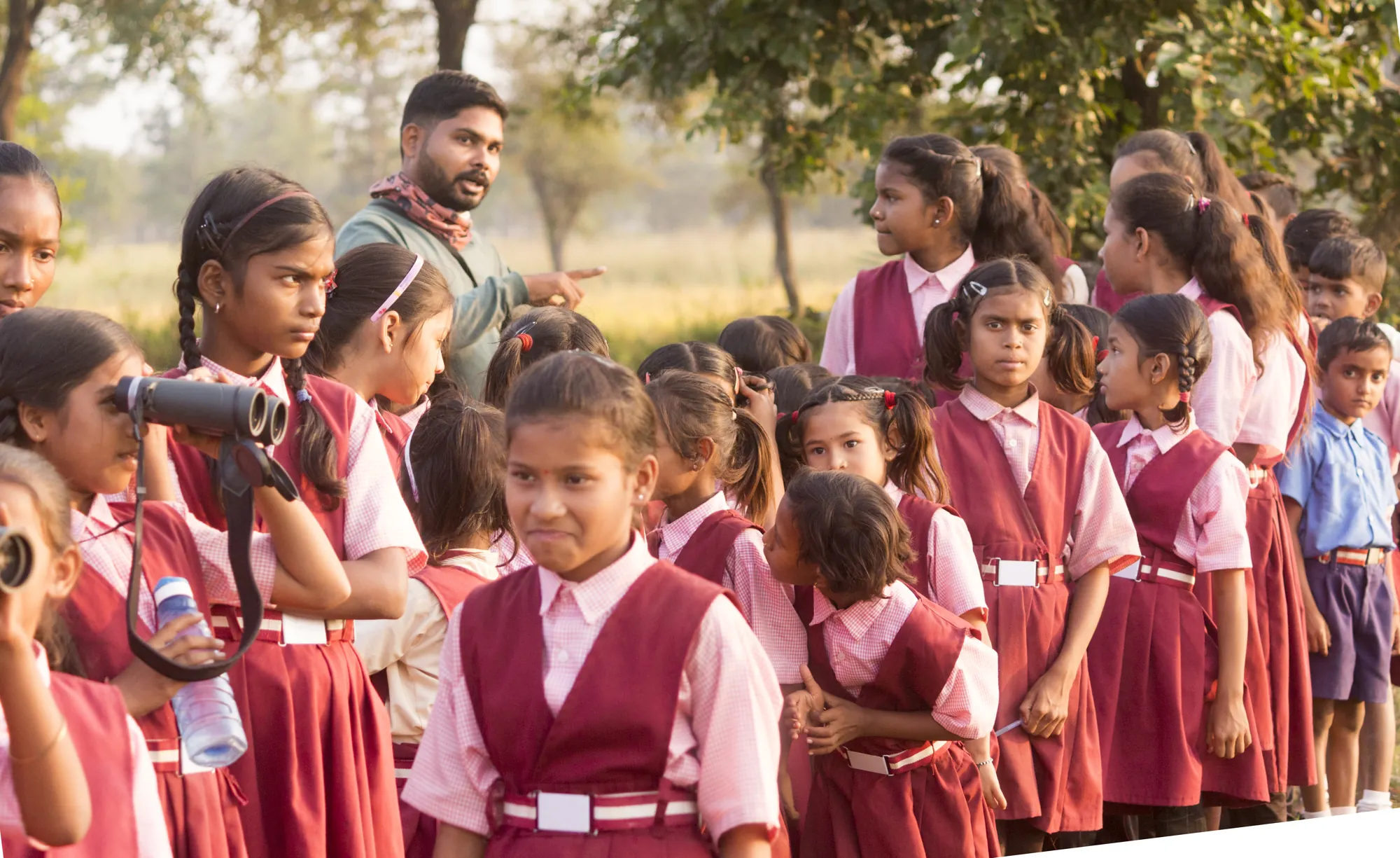 Schoolchildren participating in an outdoor nature education activity